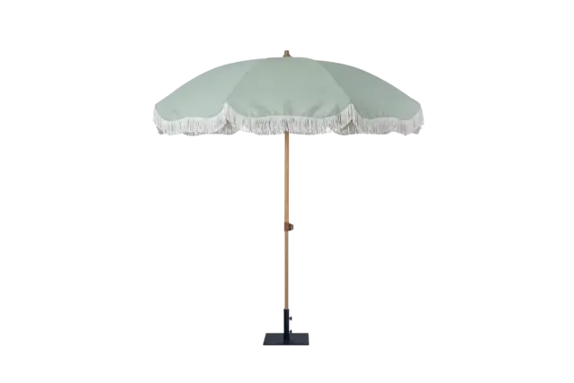 A full side view of the open Belkin fringed market umbrella with its light green canopy, wood-look metal pole, and black base against a plain background.