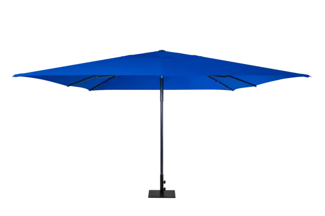 The royal blue Luciano commercial outdoor umbrella fully open, viewed from the front, showcasing its large rectangular canopy and sturdy central pole with a square base.