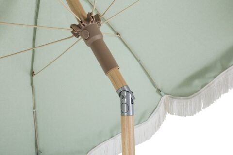 Tempo Belkin outdoor umbrella detail showing pole connection and fringe.