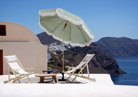 Tempo Belkin umbrella displayed outside with seating