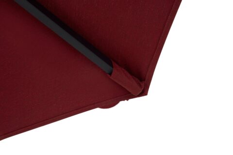 Tempo California outdoor umbrella, close up of maroon canopy showing fabric detail.
