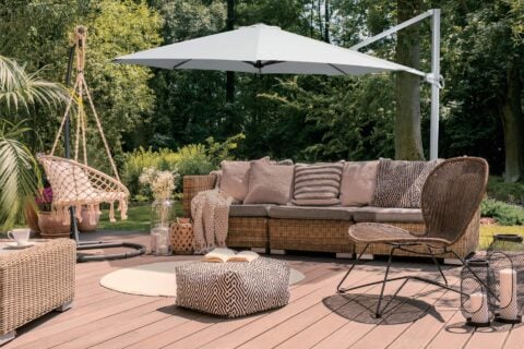Tempo Chavela umbrella in an outdoor living area with patio furniture