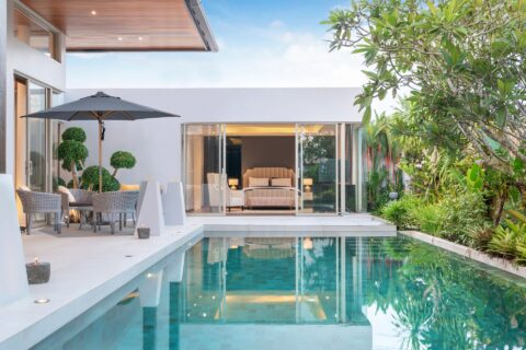 Tempo Daintree outdoor umbrella in a luxury pool-side setting