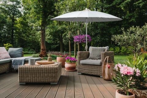 Tempo Oriental Charm umbrella in an outdoor patio setting