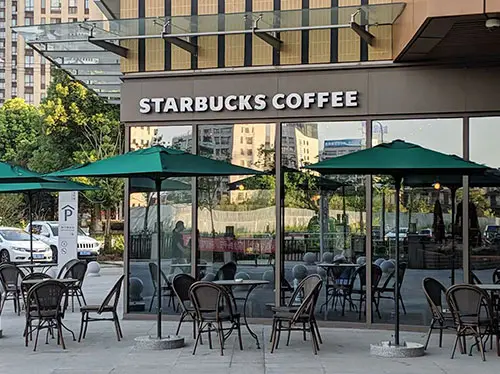 After — Taut fabric, upright frame, unified brand presence